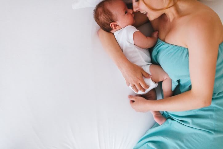 Women with New born in her arms