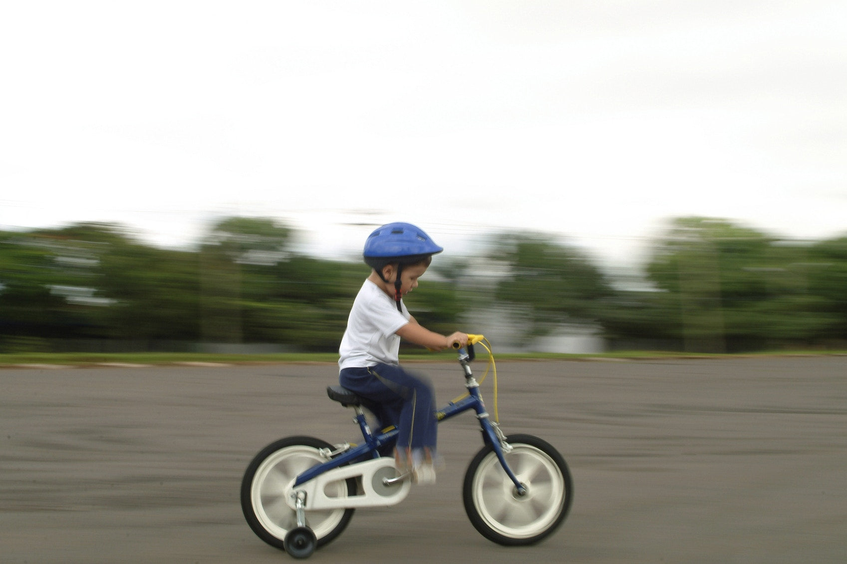 young boy riding biycle