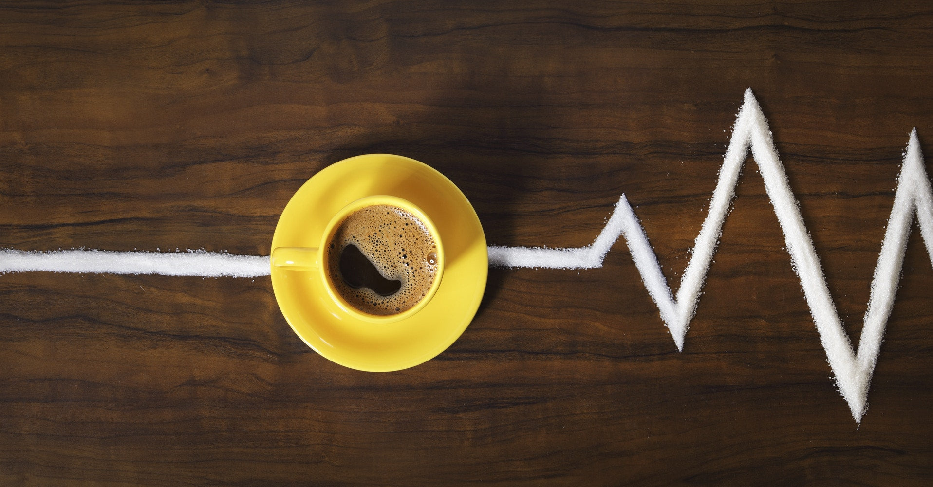 a cup of coffee with ECG line