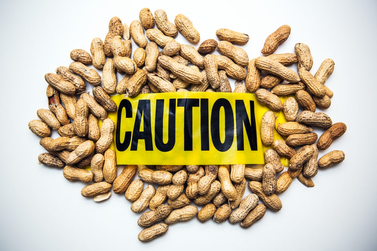 groundnuts with caution poster