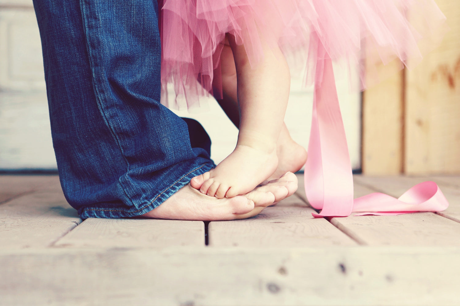 man cutting the grass with lawn mower,Woman pouring fresh water on plant in pot
