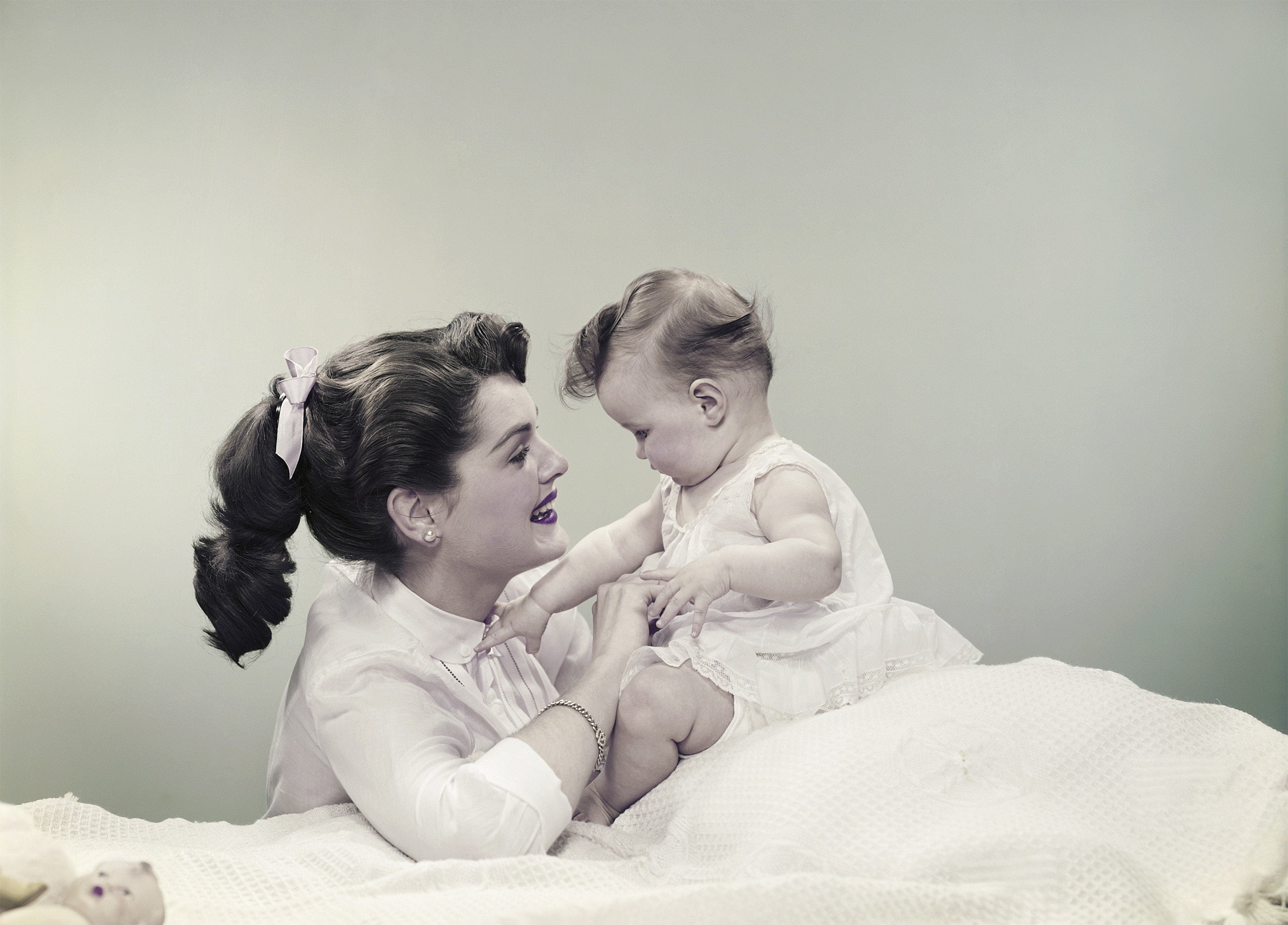 mother and baby looking at each other
