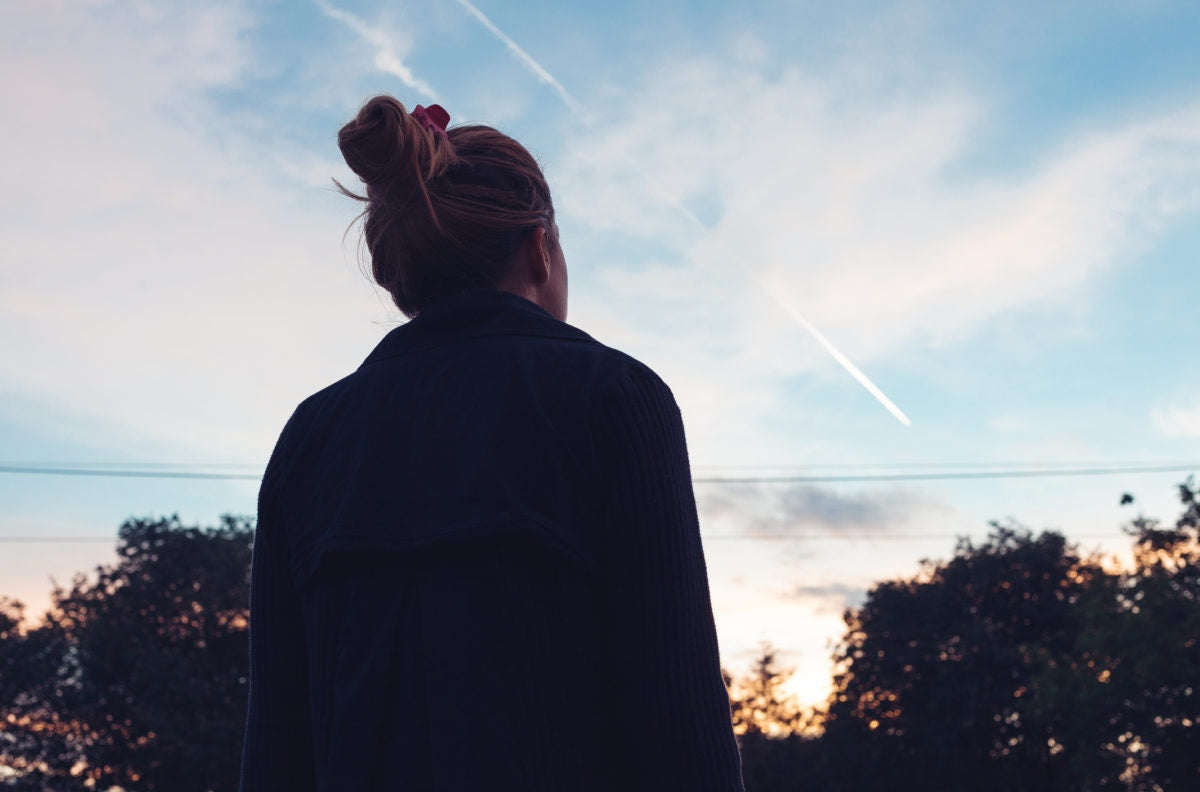 lady watching the comets in sky.