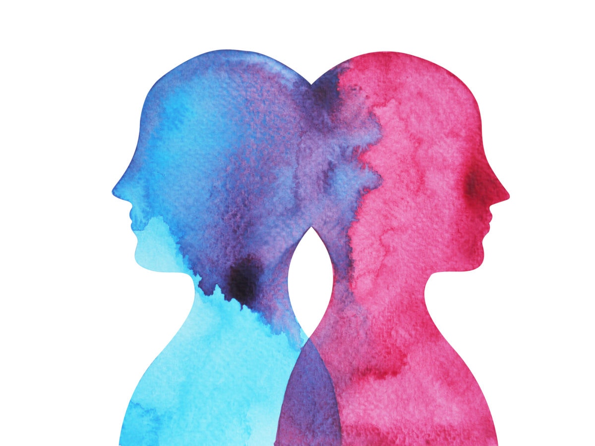 Two person merged, one in blue another in red