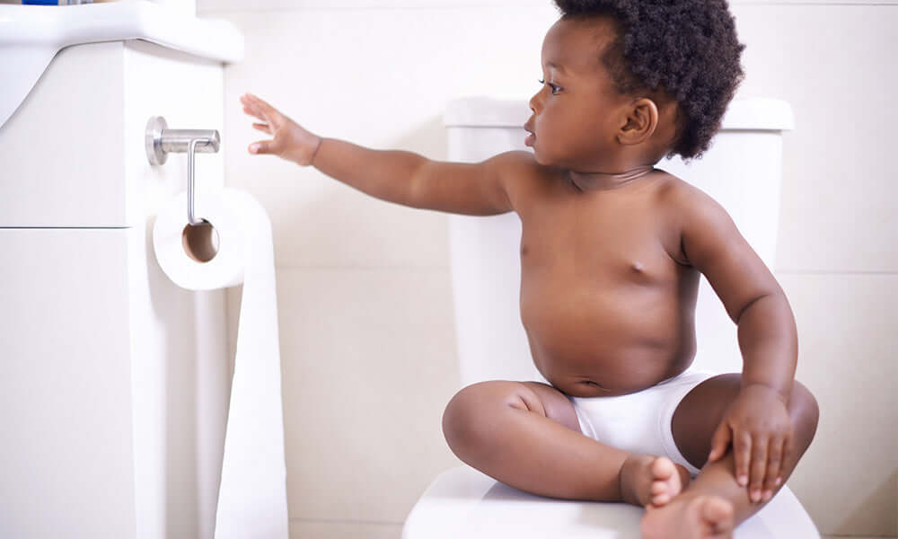 baby boy in a bathroom