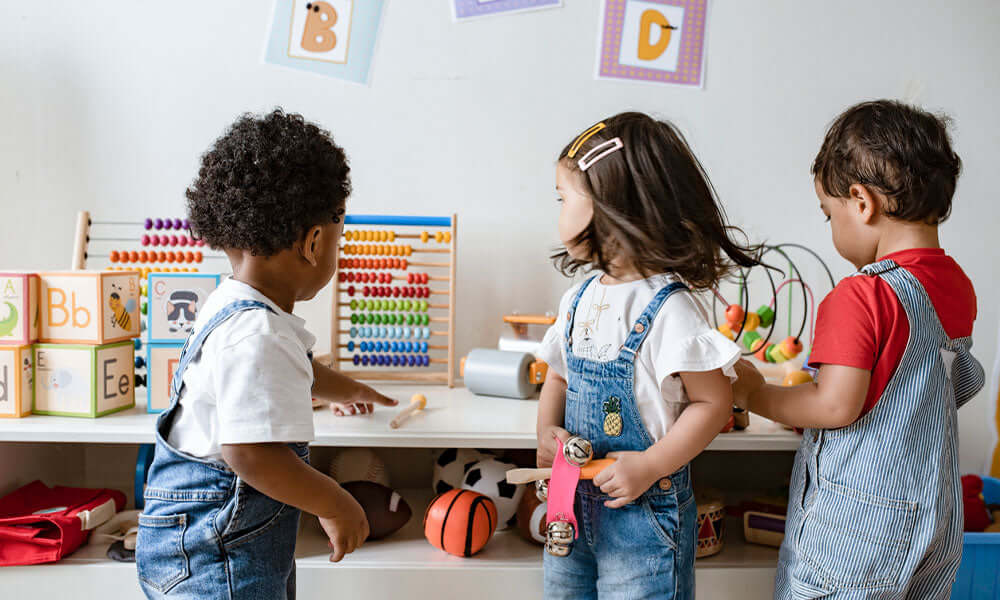 young children playing with