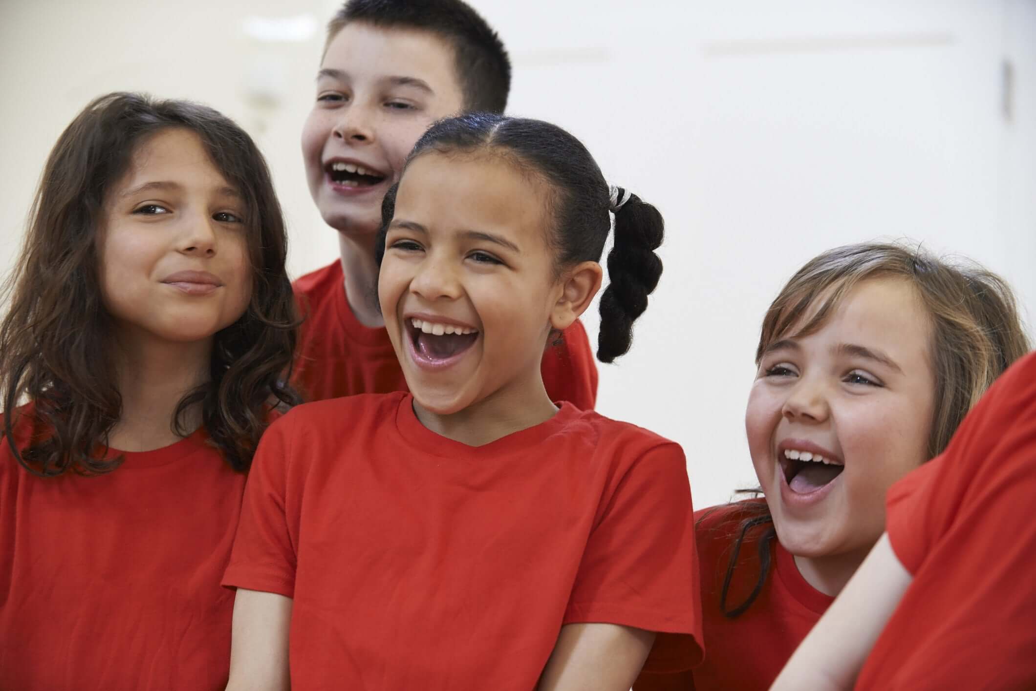 happy kids in red tshirt
