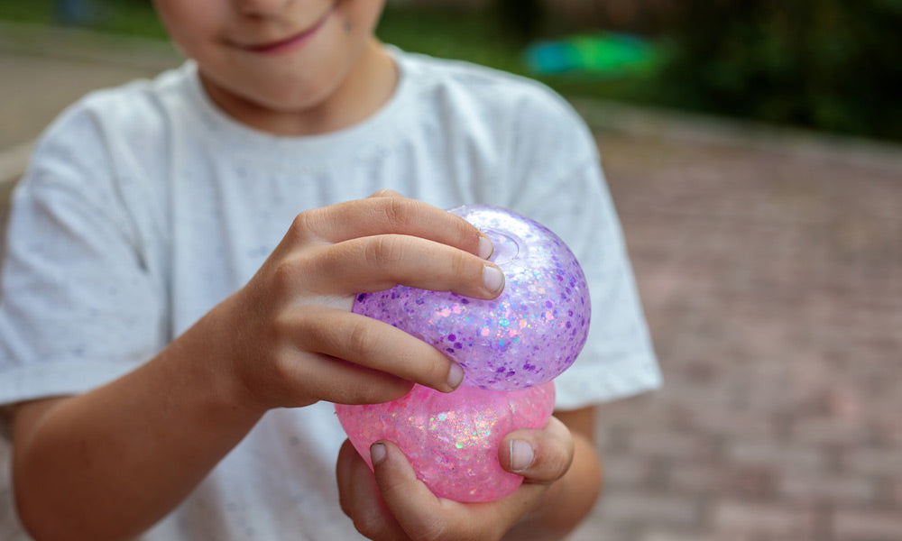 child holding a balloon