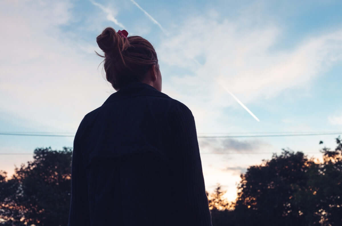 lady watching the comets in sky.