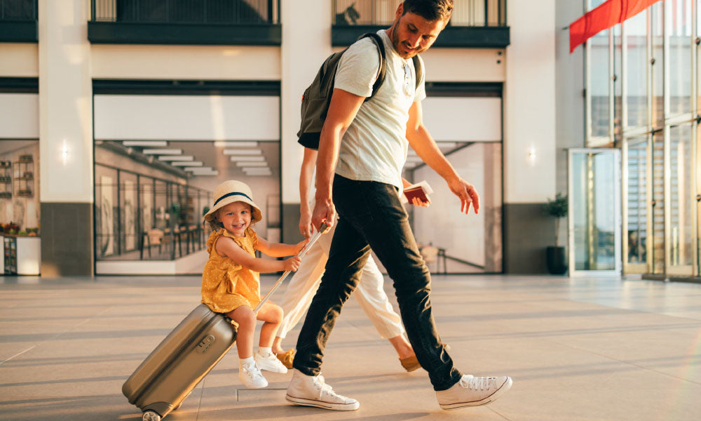 father traveling with child