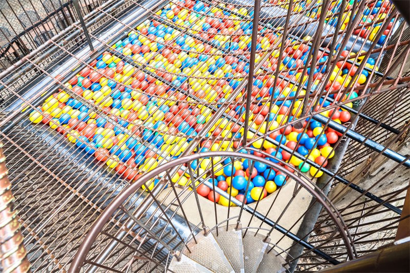urban playground with color balls in a bin