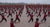 asian people doing exercises outside