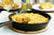 potato scallion frittata in a pan and white wine