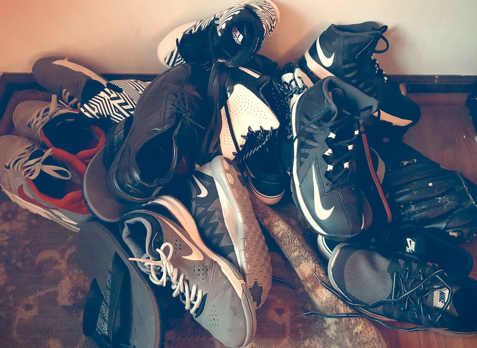 untidy stack of shoes thrown