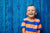 Smiling child picture with blue background