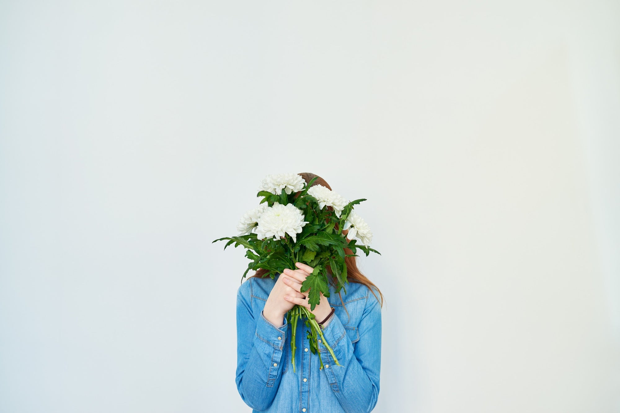 lady Covering Her Face with Flowers 