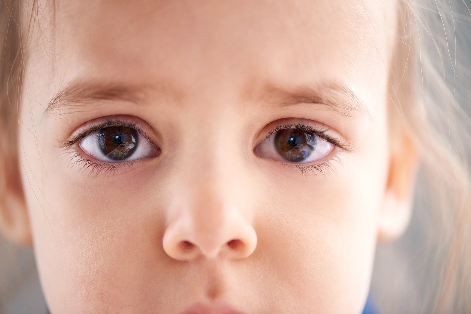 close up of a boy's tensed eyes