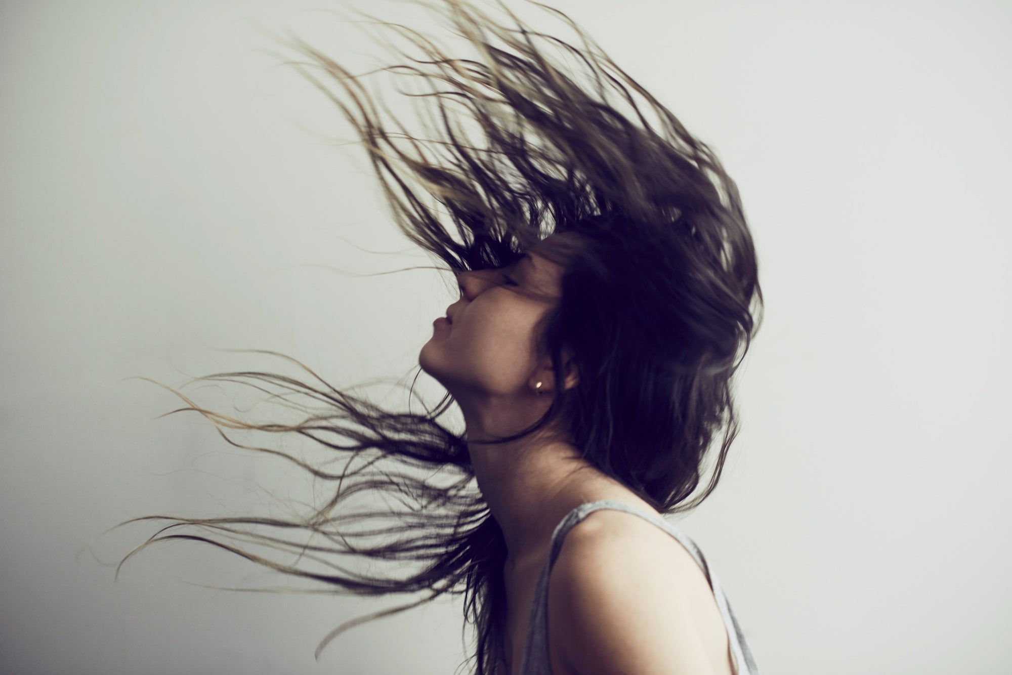 Woman With Hair Flying In The Air 
