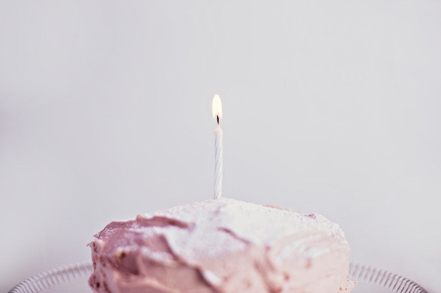 small birthday cake with candle
