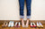 young woman trying on pair of sandals