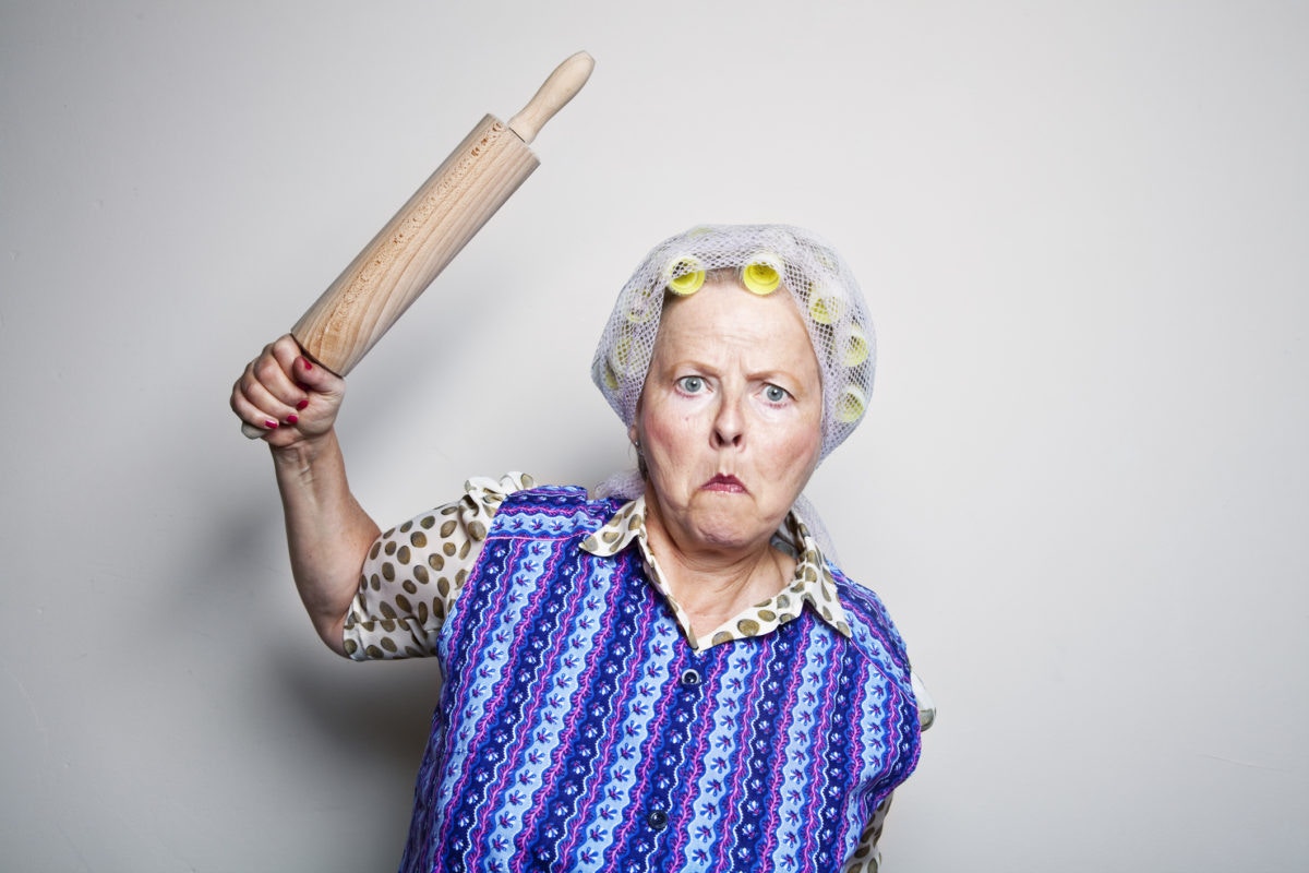angry grand mother with rolling pin