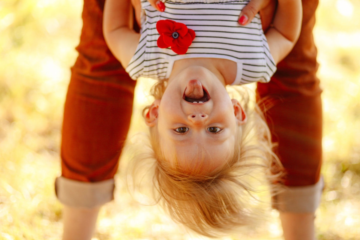 Beaming Kids Embracing Together in Room Stock Photo - Image of ...