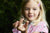 little girl holding snail
