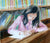 painting of a girl in library