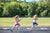 Girls running in tracks