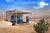 Retro Style Scene of old gas station in Desert