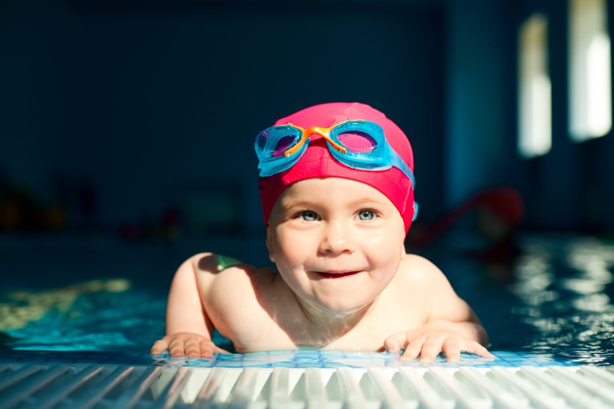 Toddler learning swimming