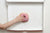 hand holding donut