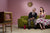 Couple watching television sitting on a sofa