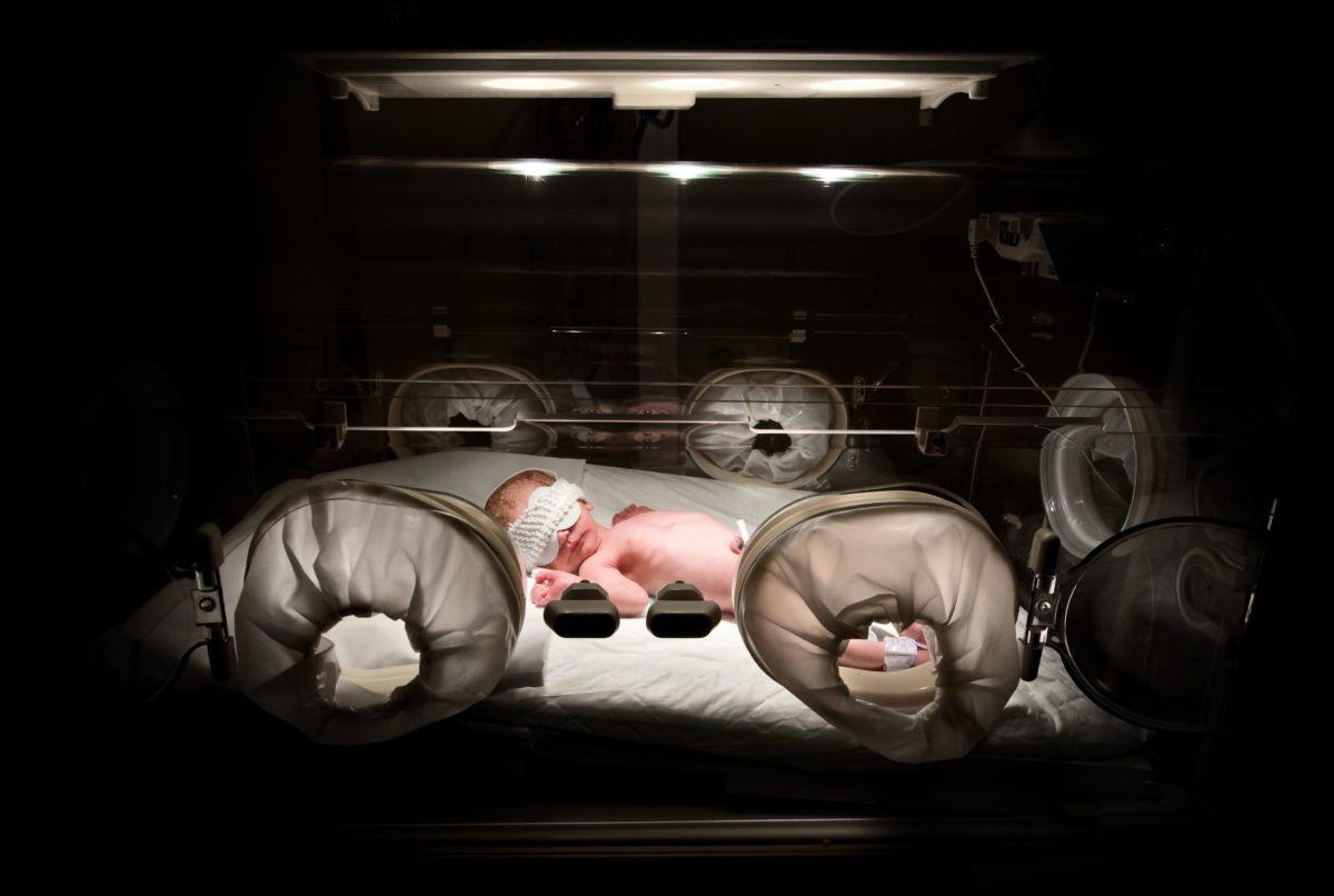 New born test tube baby slepping in a laboratory