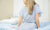 woman patiend sitting on bed in hospital