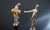 two wooden puppets on white background