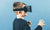Young boy with VR goggles