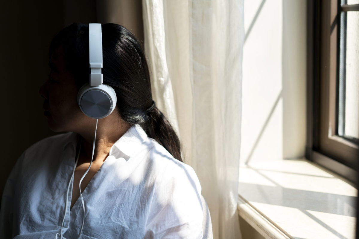 A girl is listening to music
