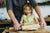 little girl making dough for homemade cookies with her father