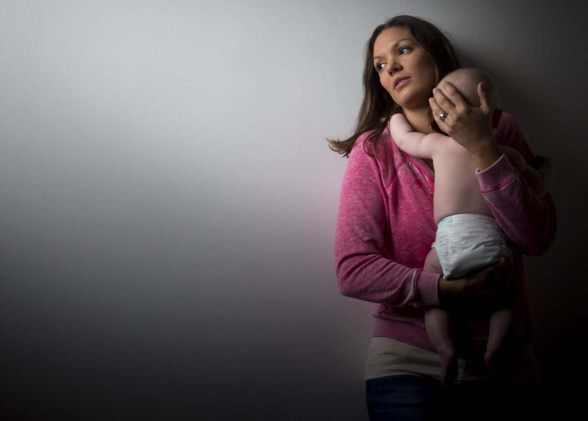 Mother holding her baby
