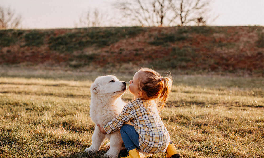girl with puppy