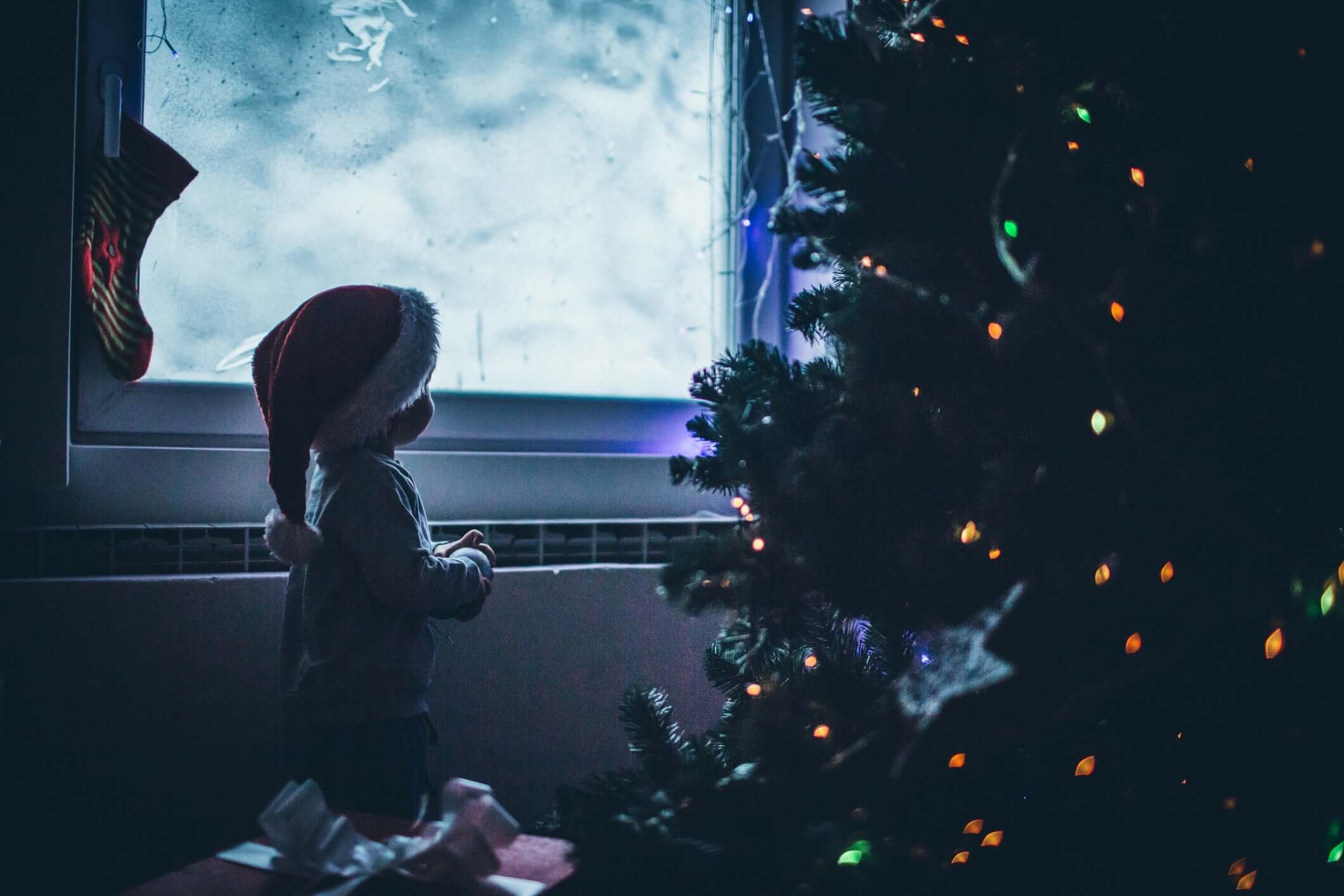 Happy Excited Toddler With Santa Hat Christmas