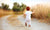 baby boy running away along the path