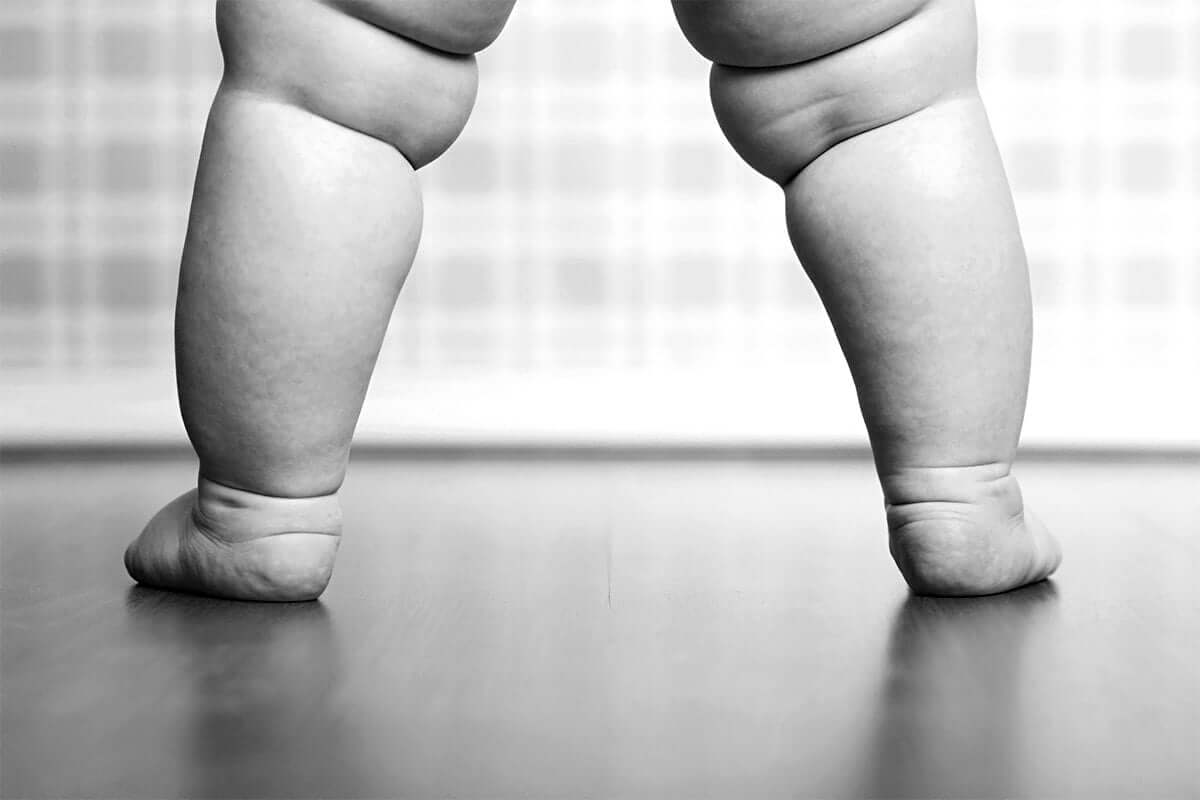 a baby standing
