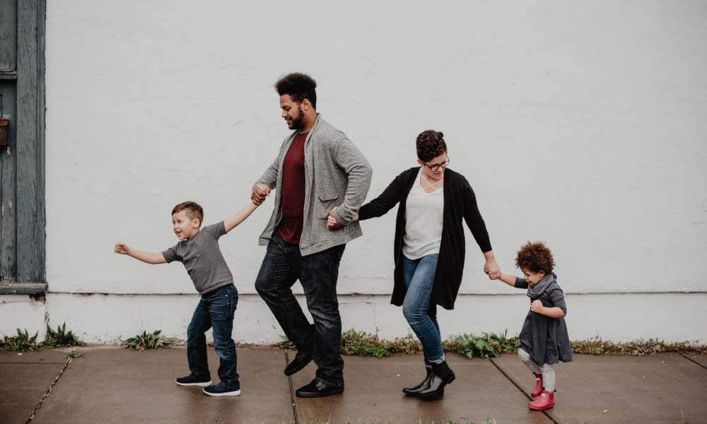 family walking on the street