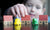  little boy playing with colorful modeling clay