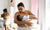 mother breastfeeding in the bedroom