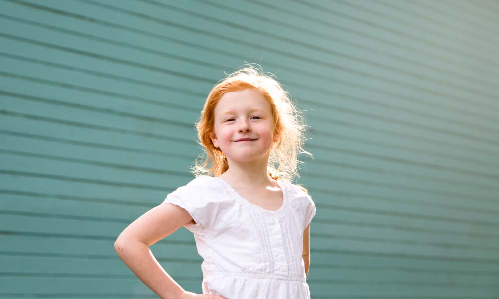 smiling redheaded girl