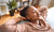 woman relaxing on her living room sofa