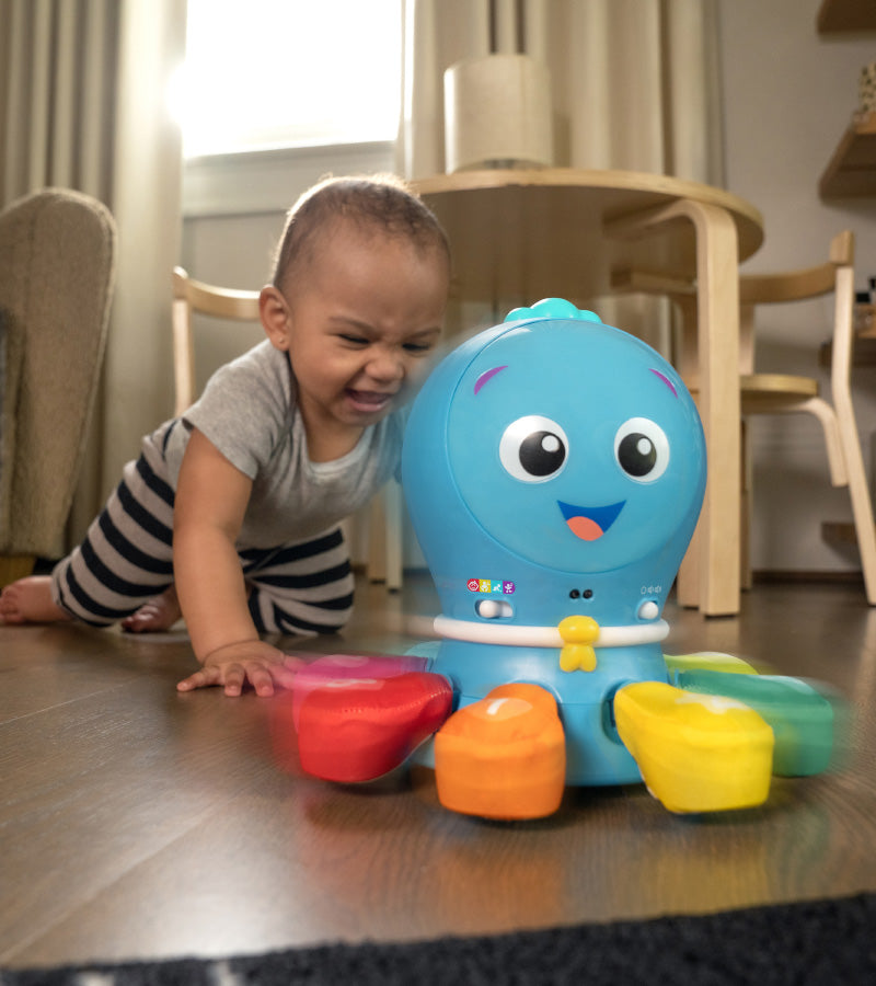 baby playing with opus